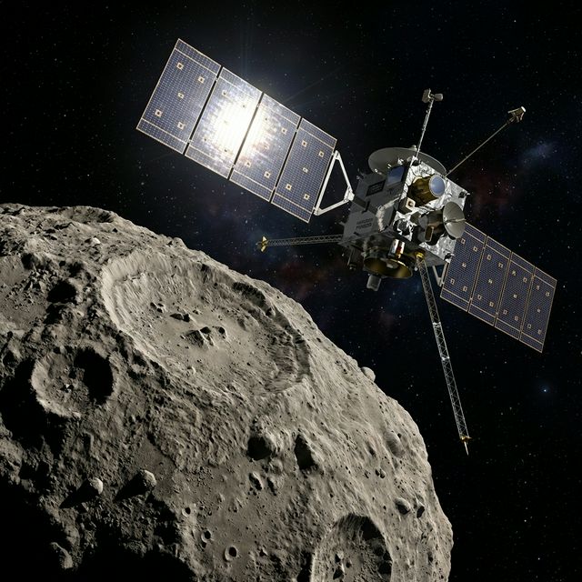 Robotic Probe Approaching Asteroid